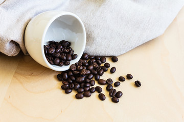 Coffee beans in coffee cup