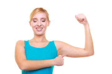 Sport woman fitness girl showing muscles. Power energy.