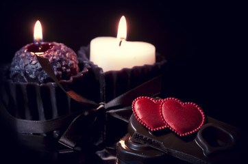 Romantic background with hearts and candles