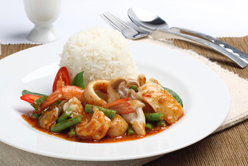 Thai food. rice and seafood with sweet and spicy sauce