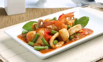 Thai food. rice and seafood with sweet and spicy sauce