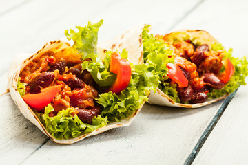 Tortilla with meat and beans