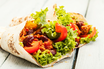Tortilla with meat and beans