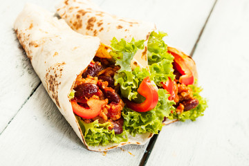 Tortilla with meat and beans
