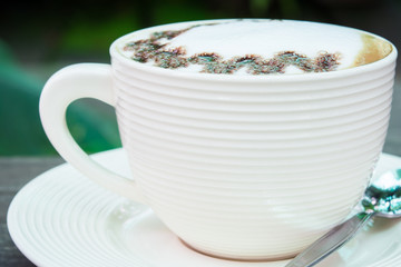 closeup macro white cup foam coffee