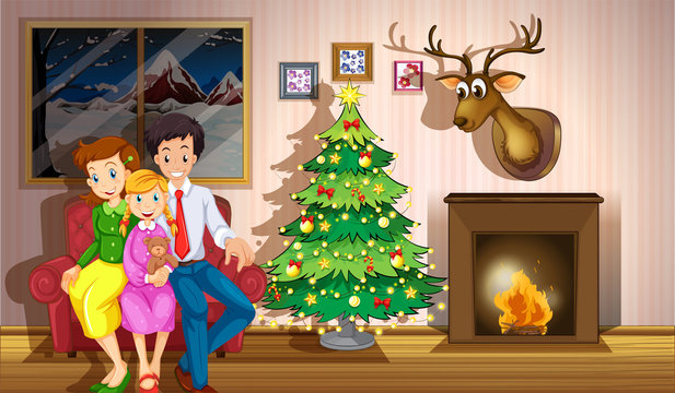 A family inside the room with a christmas tree