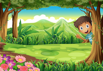 A boy playing at the forest