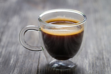Closeup of small cup with espresso