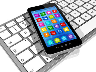 Smartphone on Computer Keyboard