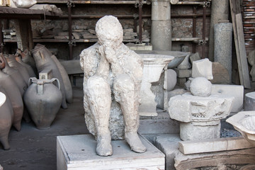Pompei man with hands covering face, Pompeii - 61533352