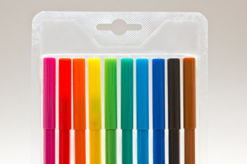 colorful markers in blister pack