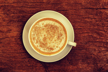 Coffee  on old wood background.