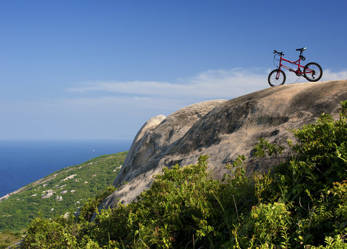 Mountain Bike over the Rock
