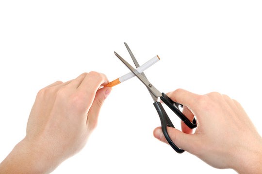 Person cutting a Cigarette closeup