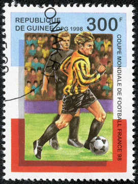 stamp printed in Guinea, shows football game