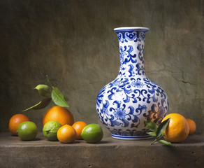 Still life with chinese vase and fruit