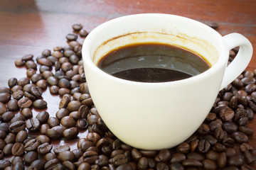 Coffee cup and beans.
