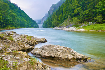 Stones on riverbank in the mountains. The Dunajec River Gorge