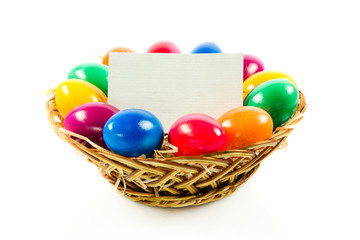 easter eggs in busket on green gras isolated