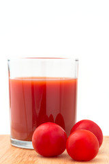 Red tomato and juice