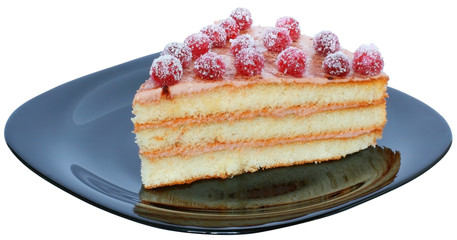 Layered piece of cake close up on a black plate