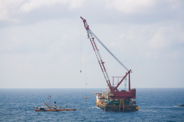 Fototapeta premium crane barge doing marine heavy lift installation