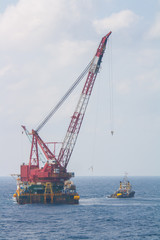 Fototapeta premium crane barge doing marine heavy lift installation
