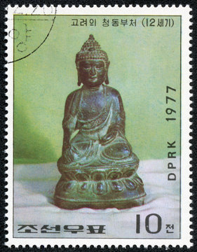 stamp printed in North Korea, shows a figure of Buddha