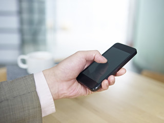 hand holding cellphone