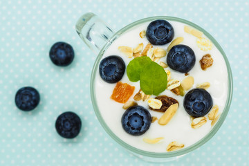 Muesli with yogurt and blueberries - healthy breakfast