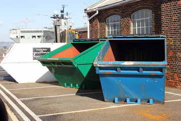 Different colored Industrial waste skips for recycling of waste