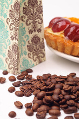 Coffee beans with fruit tartlet