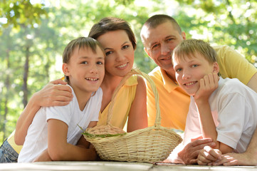 Happy family in the summer park