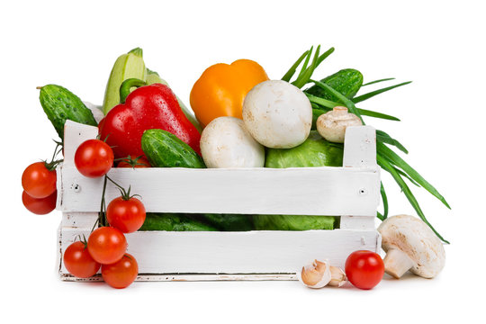 Fresh vegetables in a wooden box