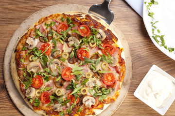 Pizza with ham and mushrooms