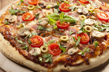Pizza with ham and mushrooms