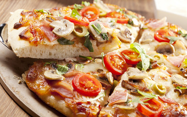 Pizza with ham and mushrooms