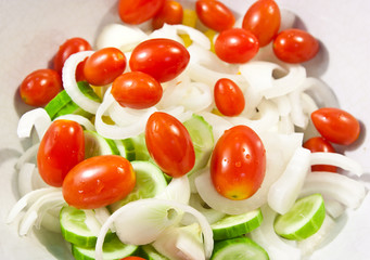 Fototapeta na wymiar Fresh vegetable salad isolated on white