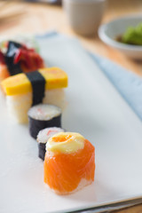 Salmon and caviar rolls served on a plate