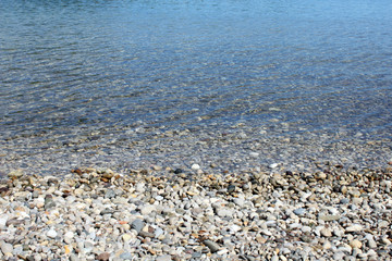 Fototapeta na wymiar Pebble stones in the sea