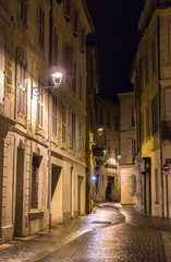 Fototapeta na wymiar A street in night Avignon - France