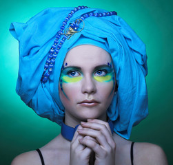 Young woman in blue turban