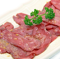 Carpaccio de magret de Canard marié à l'huile de noisette