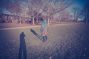 Woman being photographed in park