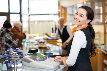 Salesperson at cash register