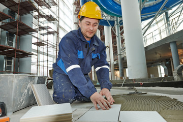 tilers at industrial floor tiling renovation