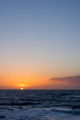 sunset and cloudscape above the dutch sea