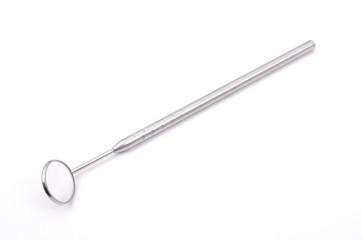 Dental mirror on white background