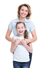 Full portrait of happy mother and young daughter
