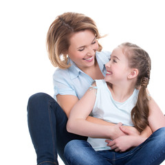 Portrait of smiling mother and young daughter